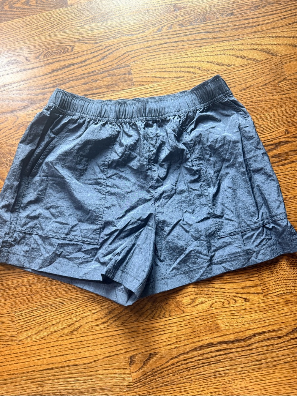Athleta Nylon EUC Shorts. Size M . pockets. Elastic waist. Black